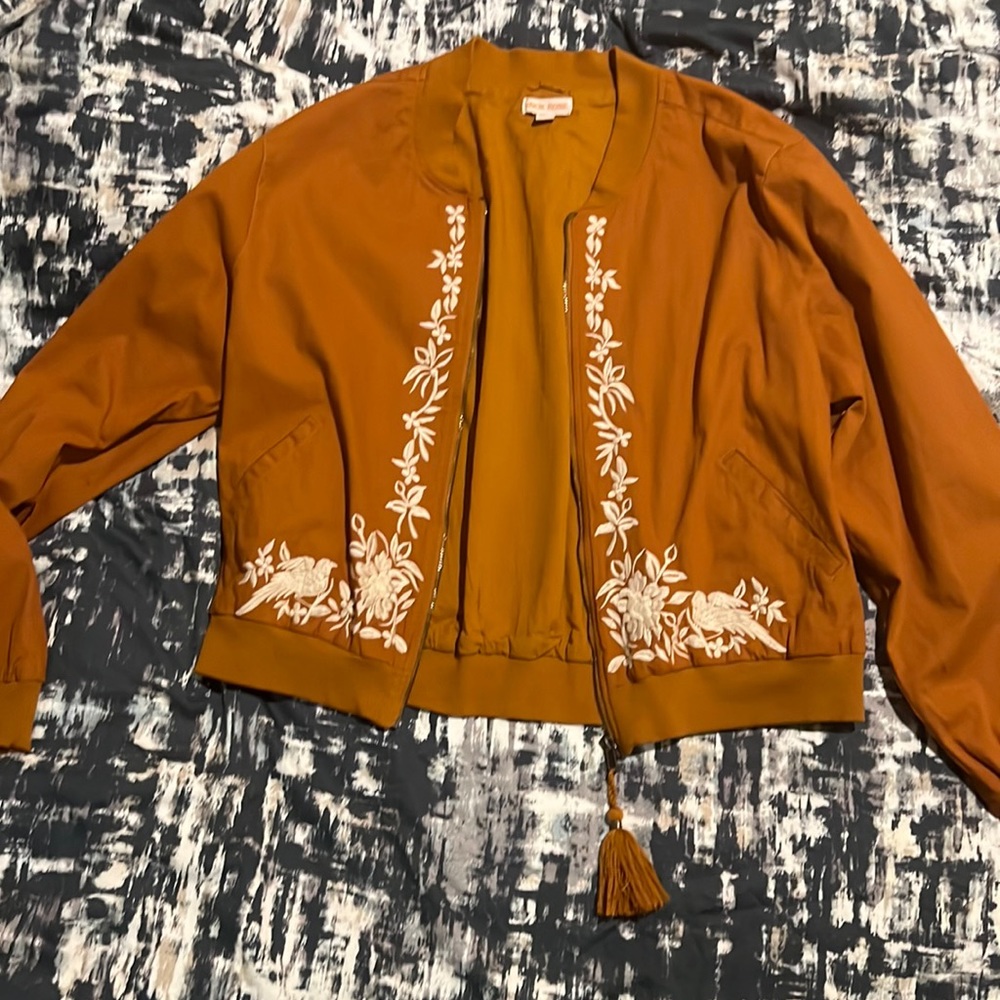 A rustic orange jacket
